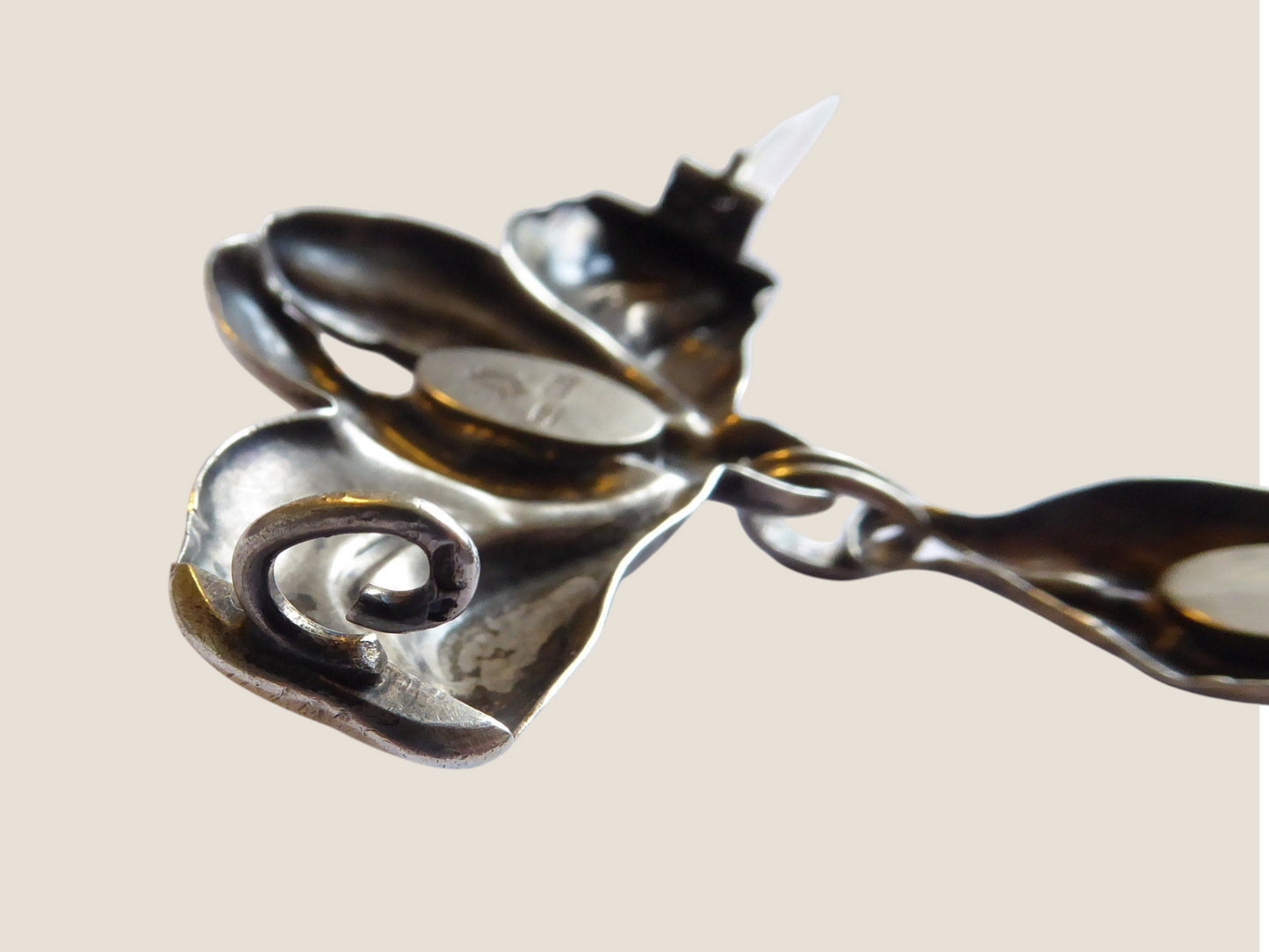 Bernhard Hertz, Denmark. Art Nouveau silver brooch, cabochon moonstones
