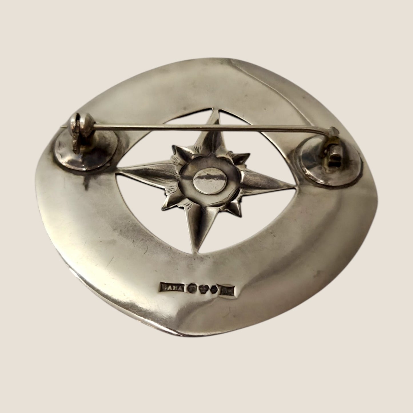 Alton, Sweden, 1962. Silver/ moonstone Zodiac brooch