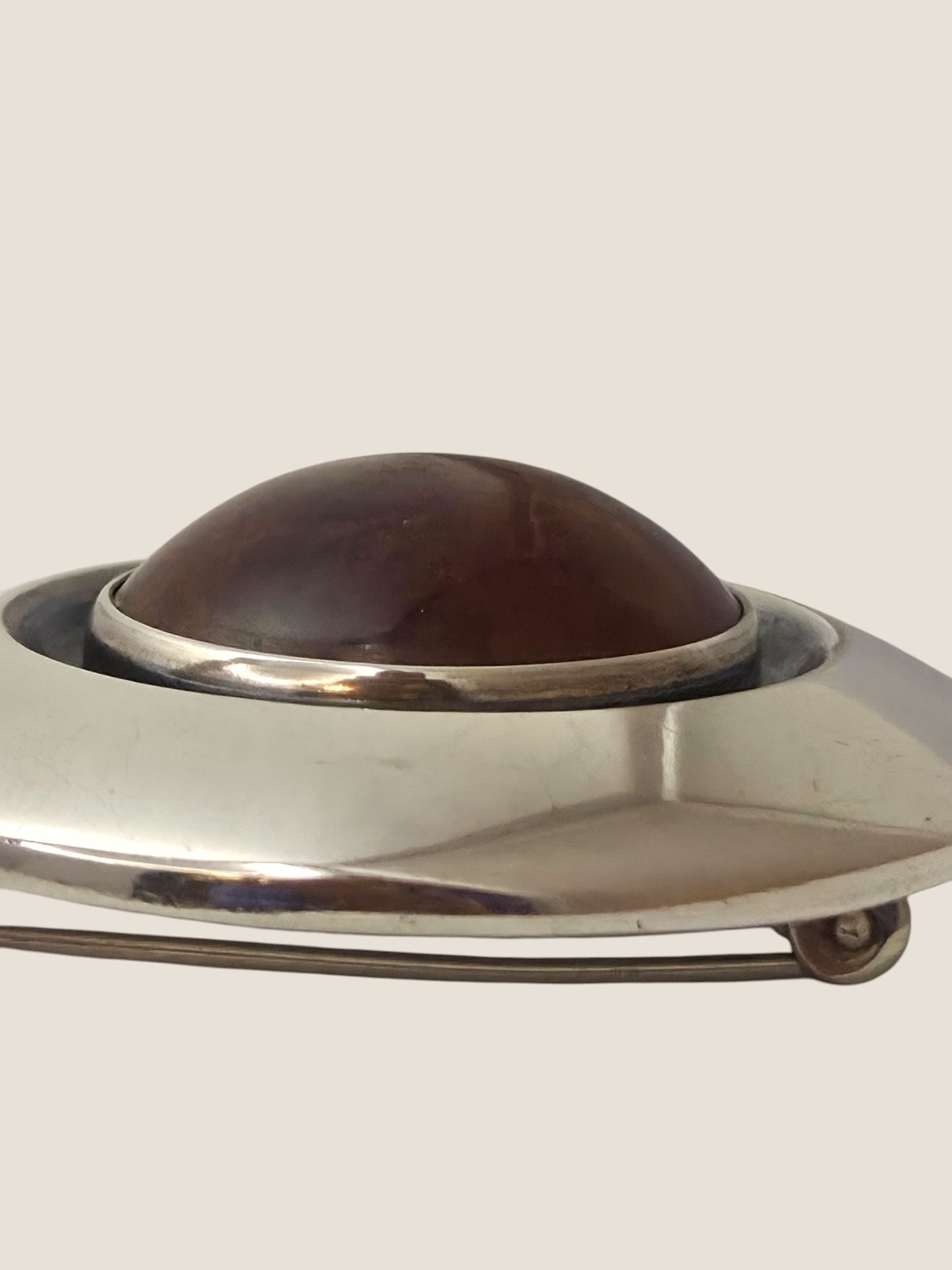 Niels Erik From, Denmark. Sterling silver brooch with amber